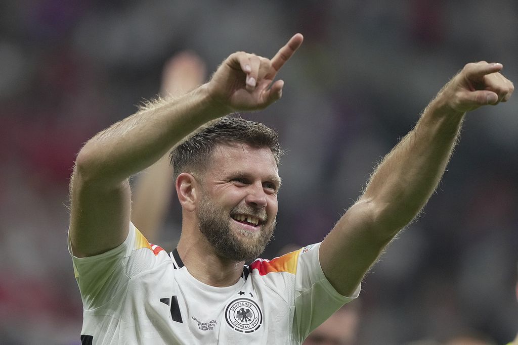 Pemain Jerman, Niklas Fuellkrug, merayakan golnya ke gawang Swiss pada laga Grup A Piala Eropa di Frankfurt, Jerman, Senin (24/6/2024) dini hari WIB. 