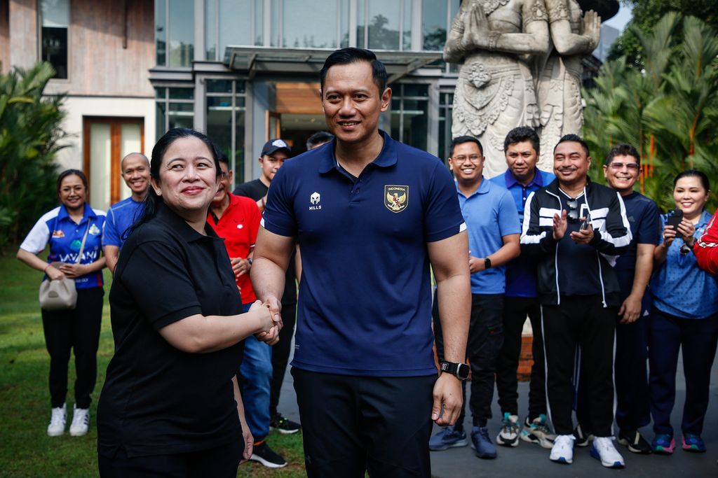 Chairwoman of the Central Executive Board of the Indonesian Democratic Party of Struggle (PDI-P) Puan Maharani (left) shakes hands with the Chairman of the Democratic Party Agus Harimurti Yudhoyono (right) in the Gelora Bung Karno area, Jakarta, on Sunday (18/6/2023).
