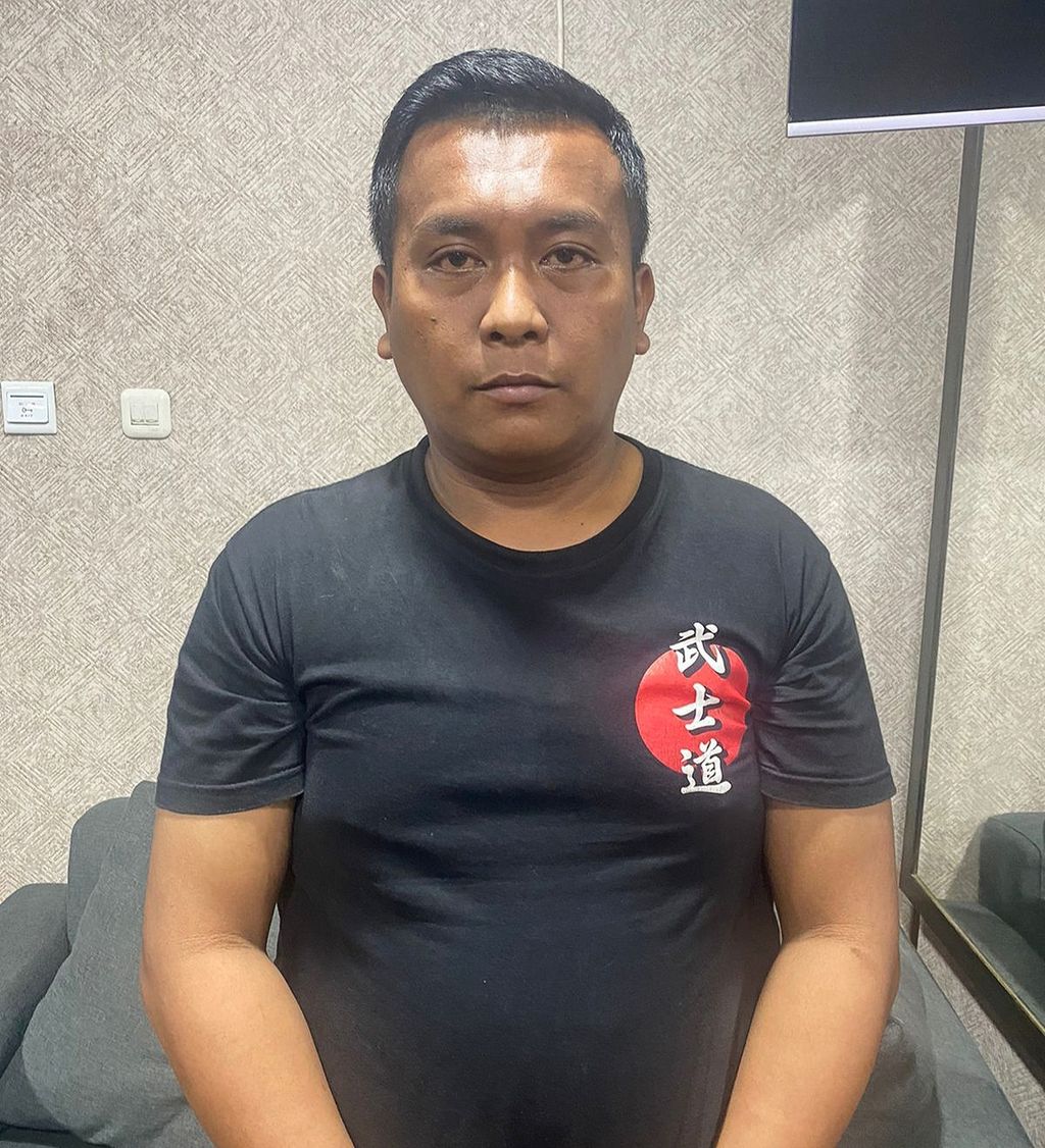 Tersangka M (30), sopir Grab, ditahan di Polres Metro Jakarta Barat, Jumat (29/3/2024).