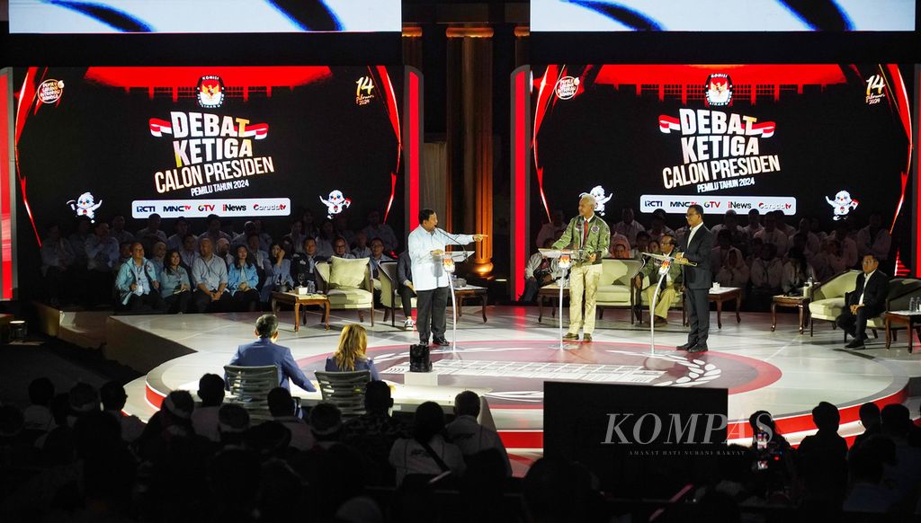 Suasana yang memanas saat digelar Debat Calon Presiden Pemilu 2024 Putaran Ketiga di Istora Senayan, Kompleks Gelora Bung Karno, Jakarta, Minggu (7/1/2024). 