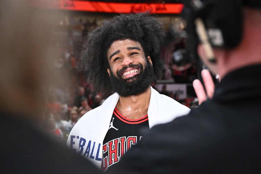 Chicago Bulls player Coby White smiles during an interview after leading his team to win the NBA play-in basketball match against the Atlanta Hawks, at the United Center, Chicago, Thursday (18/4/2024) morning WIB.