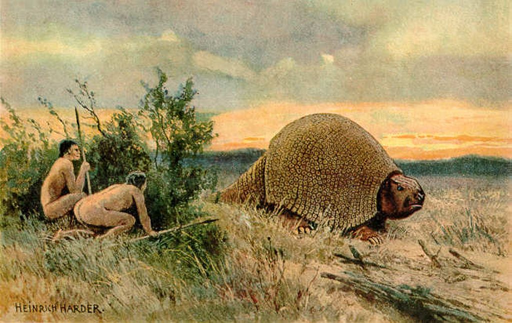 Ilustrasi dari Heinrich Harder (1858-1935) tentang masyarakat Paleo-India berburu hewan purba <i>glyptodon</i>. Di era paleolitikum, perburuan binatang tidak hanya dilakukan oleh laki-laki, tetapi juga perempuan.