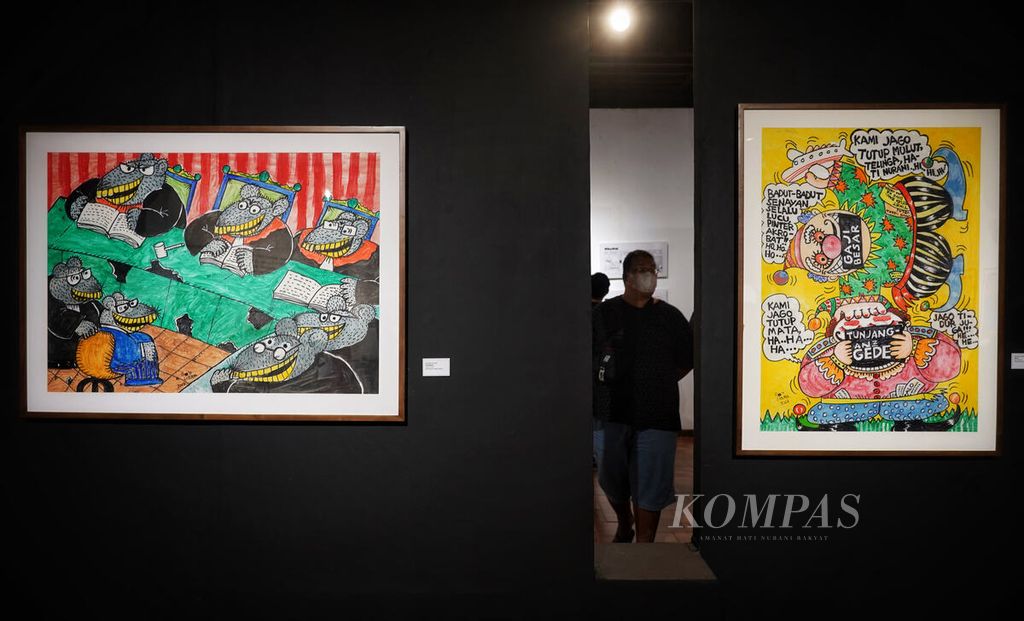 Sejumlah komik strip dan komik tunggal karakter kartun Timun karya Rahmat Riyadi dipamerkan dengan judul Parodi Negeri Kami di Bentara Budaya Jakarta, Kamis (16/2/2023). 