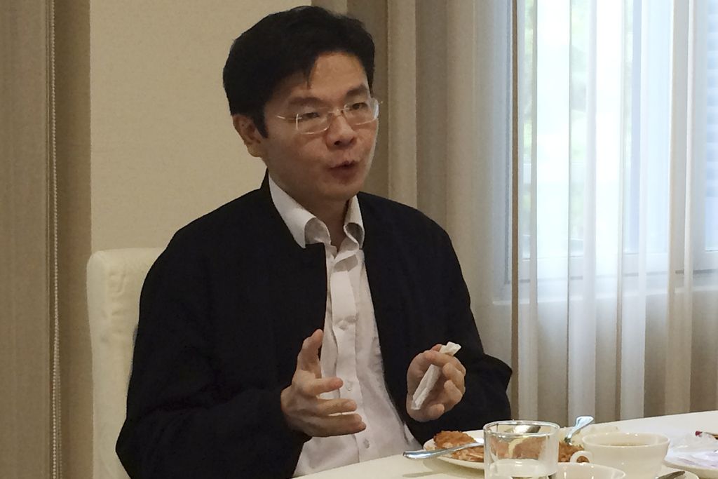 Foto  8 Mei 2015 ini memperlihatkan Lawrence Wong saat  masih menjabat Menteri Kebudayaan, Komunitas, dan Pemuda Singapura. Wong, yang kini menjabat Menteri Keuangan, Jumat (15/4/2022), ditetapkan sebagai Ketua Partai Aksi Publik (PAP), sekaligus disiapkan menjadi calon perdana menteri untuk menggantikan Lee Hsien Loong.