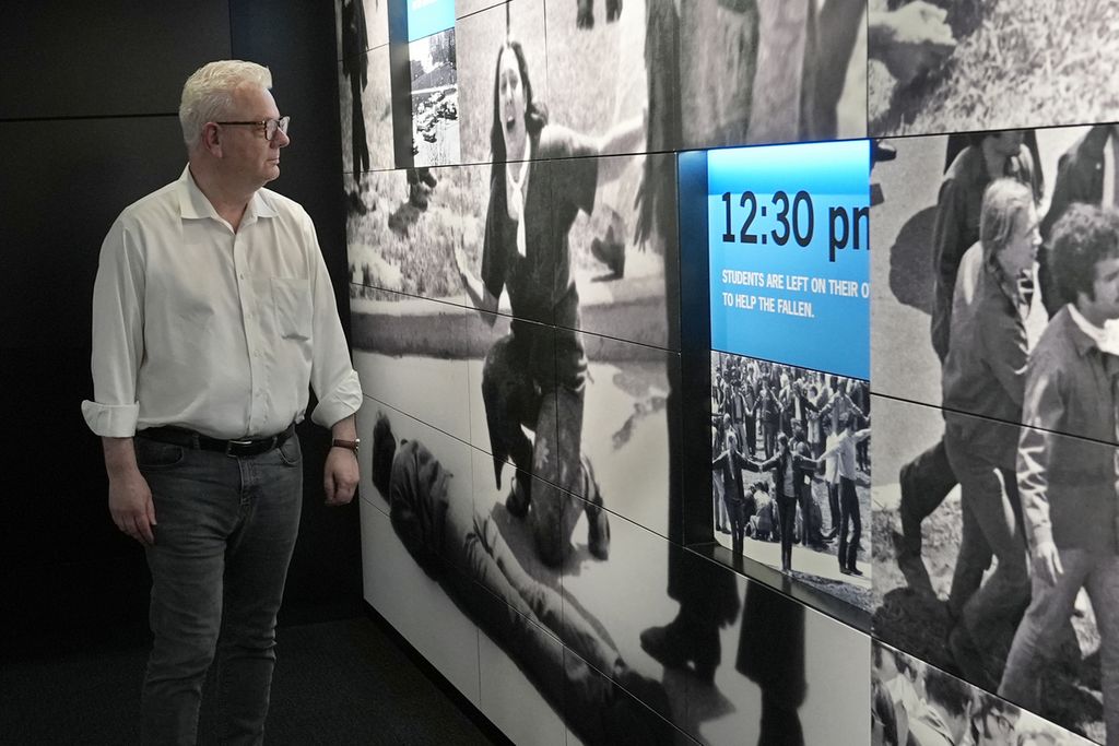Neil Cooper, a lecturer at Kent State University and Director of the School of Peace and Conflict Studies, viewed exhibits at the May 4 Visitor Center on May 1, 2024, in Kent, Ohio, USA. Kent State University commemorated the shooting by National Guardsmen that killed four students and injured nine others on May 4, 1970.