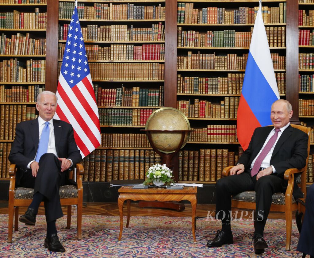 U.S. President Joe Biden, left, and Russia’s President Vladimir Putin, right, pose for the media at Villa La Grange for the U.S.-Russia summit in Geneva, Switzerland, Wednesday, June 16, 2021. 