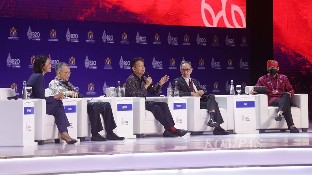 From right to left: Tourism and Creative Economy Minister Sandiaga Uno, Financial Services Authority Chairman Mahendra Siregar, Health Minister Budi Gunadi Sadikin, and Energy and Mineral Resources Minister Arifin Tasrif speaking at the opening of the B20 event in Nusa Dua, Bali, on Sunday (13/11/2022). 