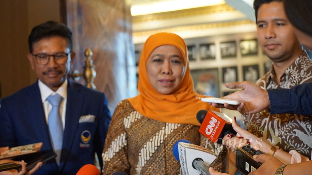 Pasangan Gubernur dan Wakil Gubernur Jawa Timur terpilih Khofifah Indar Parawansa-Emil Elestianto Dardak mengunjungi Kantor DPP Partai Nasdem di Jakarta, Senin (9/7/2018). 