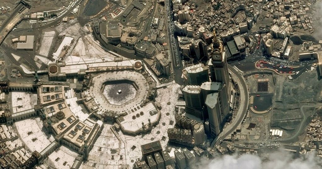 This handout satelite image released by Airbus Defence and Space on August 11, 2019 shows a gereral view of the Saudi holy city of Mecca with the Kaaba, Islam's holiest shrine in the centre of the picture, during the climax of the annual Hajj pilgrimage this year.