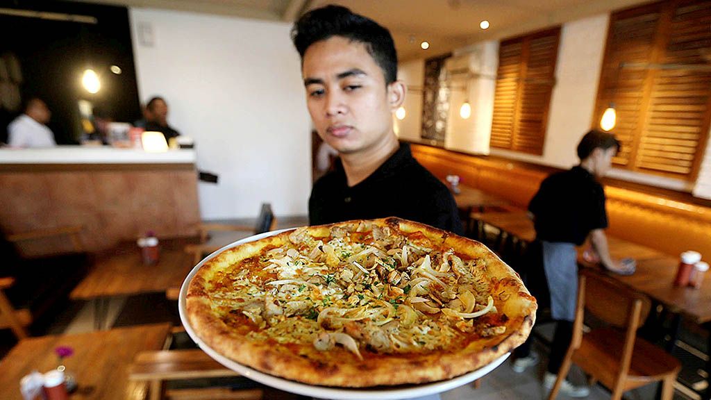 Pizza woku di Pizzeria Cavalese, Sunter, Jakarta, Sabtu (26/1).