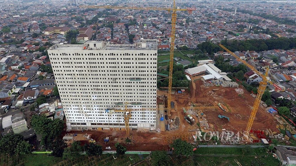Progres pembangunan rumah susun sederhana milik (rusunami) DP Rp 0 atau samawa (solusi rumah warga) Klapa Village di Pondok Kelapa, Jakarta Timur, yang telah mencapai lebih dari 50 persen, Jumat (22/3/2019). DKI membebaskan Pajak Bumi dan Bangunan bagi sejumlah kalangan.