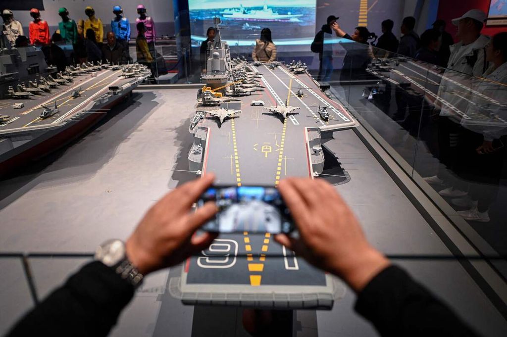 A replica of China's aircraft carrier, the Liaoning, is on display at the Chinese Naval Museum in Qingdao, Shandong, on April 23, 2024.