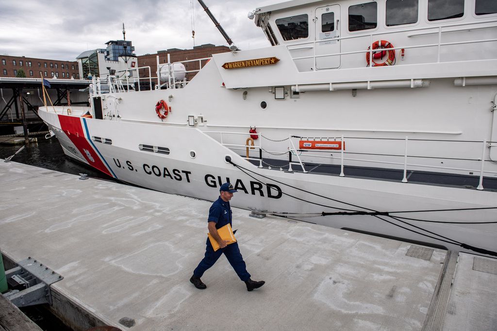 Coast Guard officers walked across a Coast Guard ship in Boston, Massachusetts, USA, on June 20, 2023.
