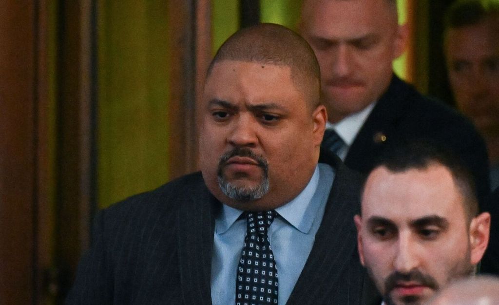 New York District Attorney, United States, Alvin Bragg (left) leaving his office, March 30, 2023.