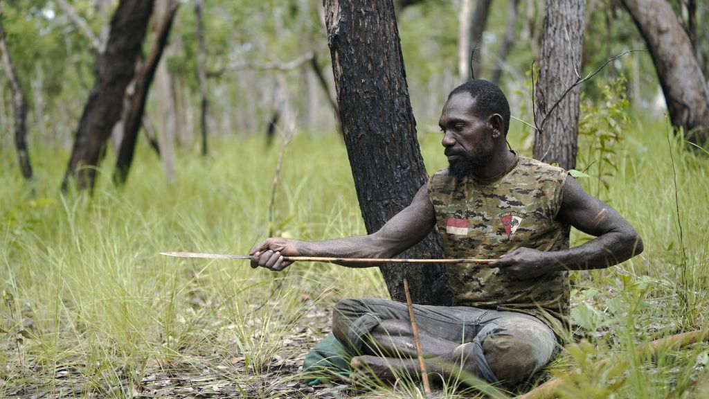 Solomon Maywa concentrates before loosing an arrow while hunting for kangaroos in the forest of Yakyu hamlet, Rawa Biru village, Sota district, Merauke regency, Papua, on 12 March, 2020. Yakyu village is only about 900 meters from Indonesia’s border with Papua New Guinea. There is a military task force post by the village, which is inside in the Wasur National Park (TN), with 23 families living there.