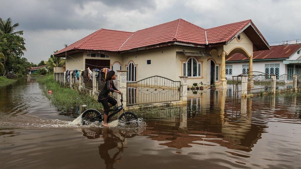 Banjir akibat meluapnya Sungai Siak di Kota Pekanbaru Riau, Senin (4/12/2017).