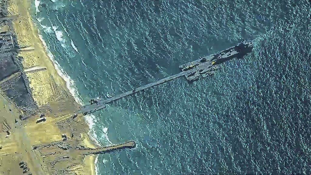 The image from the US Central Command shows US soldiers who are assigned to the 7th Transportation Brigade (Expeditionary) and the Israeli Defense Forces placing the Trident dock on the shore of the Gaza Strip on May 16, 2024.