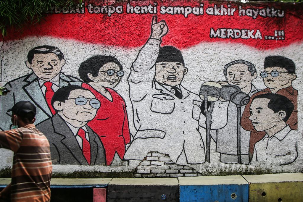 Mural tujuh presiden Republik Indonesia tergambar secara kartunal di sebuah dinding di kawasan Pisangan, Tangerang Selatan, Banten, Minggu (14/11/2021).