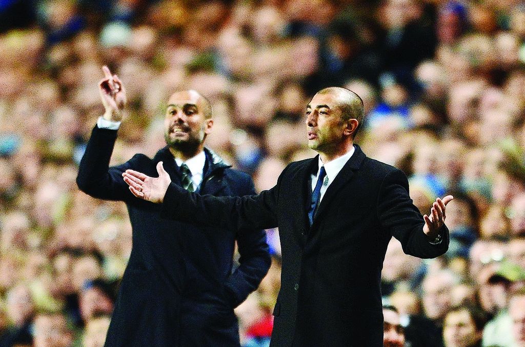 Reaksi manajer sementara Chelsea Roberto Di Matteo (kanan) dan manajer Barcelona Josep Guardiola pada laga pertama semifinal Liga Champions di Stadion Stamford Bridge, London, 18 April 18 2012. 
