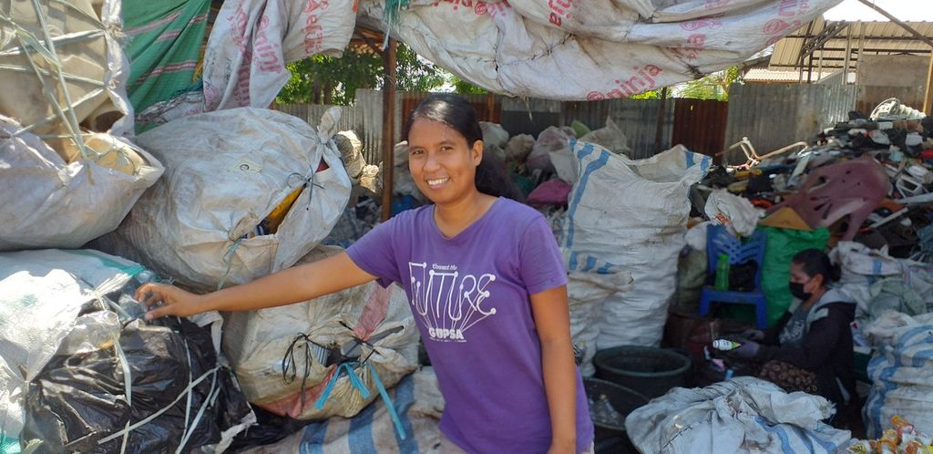 Meilsi Mansula, founder and administrator of "Mutiara Timor", a waste bank or waste management in Kupang, Nusa Tenggara Timur. She shows piles of waste bag, bought from communities. Mutiara Timor buy Rp 1.500 - Rp 6.000 for a kg of waste.