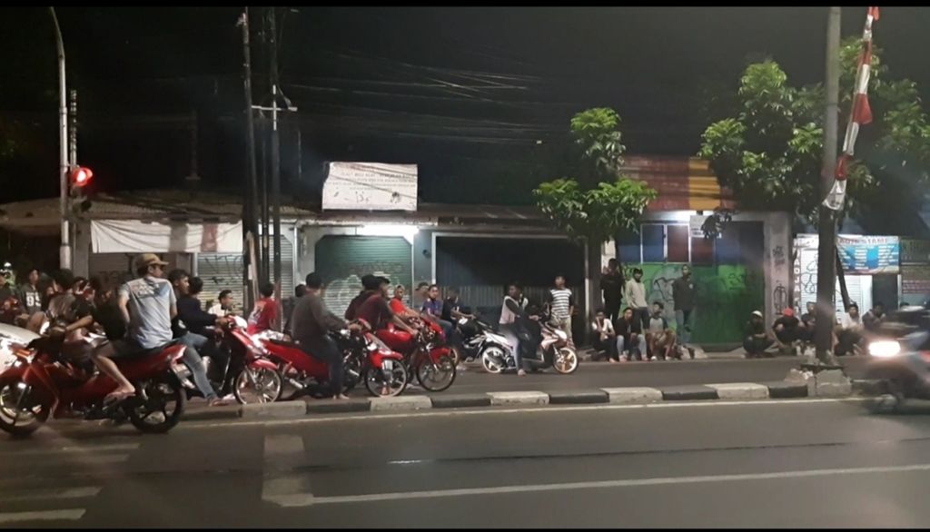 Aksi balap liar terjadi pada Jumat (17/8/2018), di Jalan Raya Bogor, Jakarta Timur.