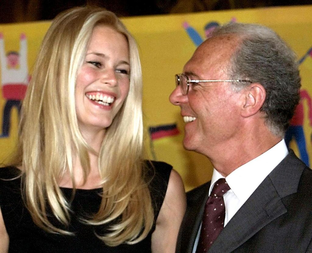 Photo archives show German football legend Franz Beckenbauer posing alongside German supermodel Claudia Schiffer during a press conference in Zurich, Switzerland on July 5, 2000. At the time, Germany had submitted their bid to host the 2006 World Cup. Beckenbauer, who had once lifted the World Cup trophy as both a player and coach, passed away at the age of 78.