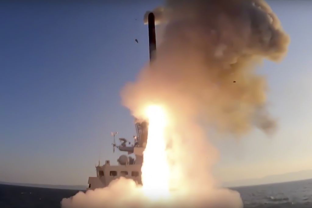 In this handout photo released by Russian Defense Ministry Press Service on Tuesday, Oct. 11, 2022, a Russian warship launches a cruise missile at a target in Ukraine. 