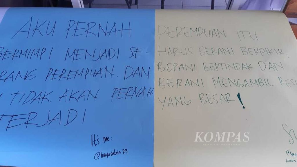 Tulisan tangan berisi pandangan tentang perempuan dari peserta peringatan hari perempuan dunia di Banda Aceh, Aceh, Senin (8/3/2021).