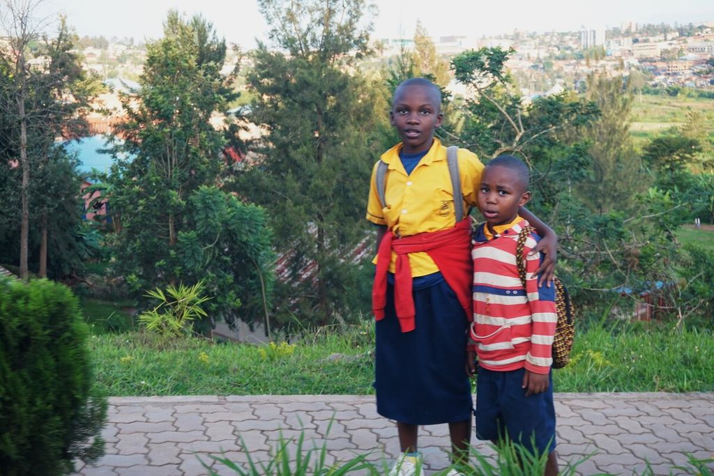 Two children walk after school in the city of Kigali, Rwanda, Wednesday (1/5/2024).