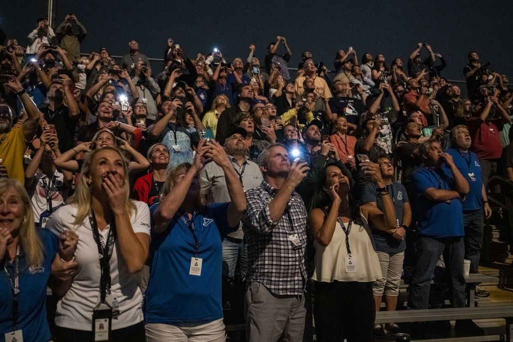  In this handout provided by the U.S. National Aeronautics and Space Administration (NASA), guests at the Banana Creek viewing site watch the launch of NASAs Space Launch System rocket carrying the Orion spacecraft on the Artemis I flight test, from Launch Complex 39B on November 16, 2022, at the Kennedy Space Center, Florida.