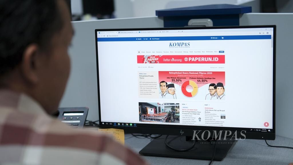 Tampilan laman Kompas.id yang dibuka salah satu warga di Jakarta, Rabu (22/5/2019). Di tengah gempuran media sosial, media arus utama saat ini masih menjadi acuan informasi bagi warga.
