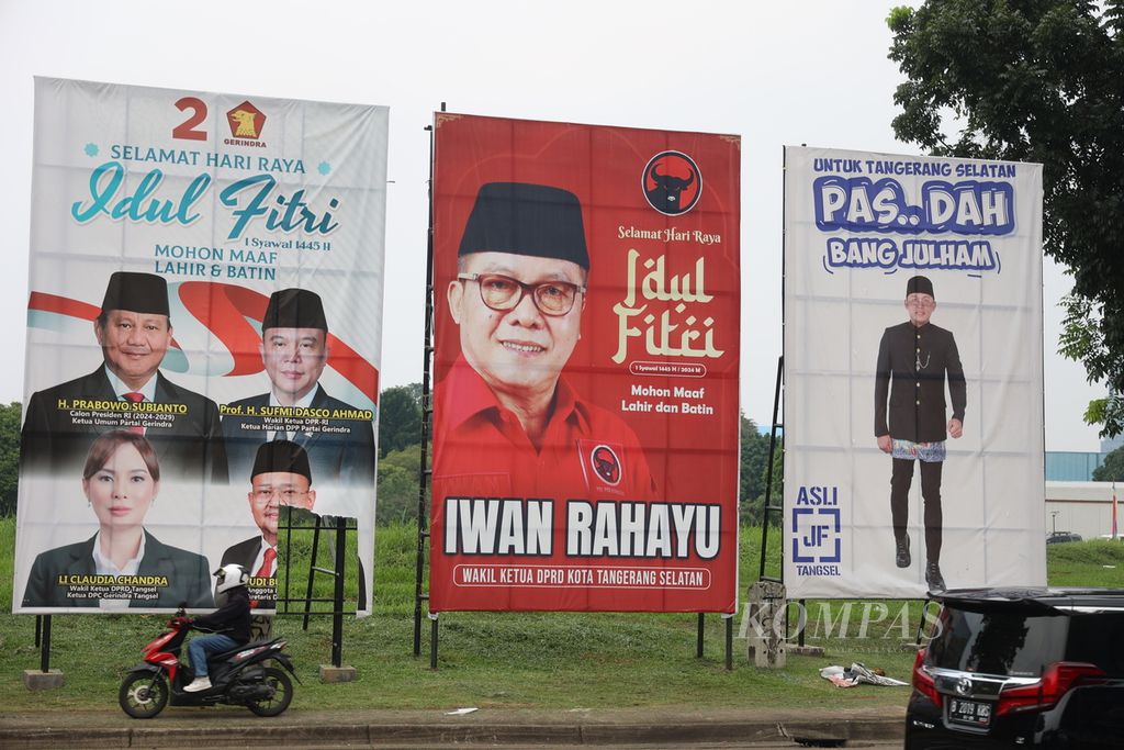 Para tokoh yang akan berkontestasi dalam pilkada mulai memasang gambar sebagai upaya mengenalkan diri kepada masyarakat seperti terlihat di kawasan Serpong, Tangerang Selatan, Banten, Rabu (1/5/2024). 