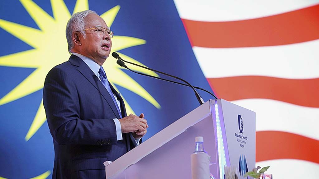Perdana Menteri Malaysia  Najib Razak sedang berbicara dalam pertemuan pasar modal dunia, di Kuala Lumpur, 6 Februari lalu. Najib diperkirakan akan kembali berhasil memenangi pemilu Malaysia yang dijadwalkan berlangsung pada Agustus mendatang.