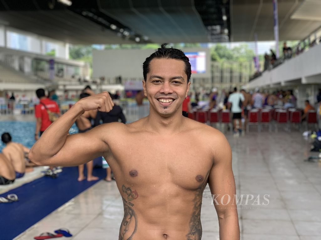 Perenang senior Indonesia, I Gede Siman Sudartawa (28), pada nomor 50 meter gaya punggung Kejuaraan Akuatik Indonesia Open (IOAC) 2022 di Stadion Akuatik Gelora Bung Karno, Jakarta, Selasa (13/12/2022).