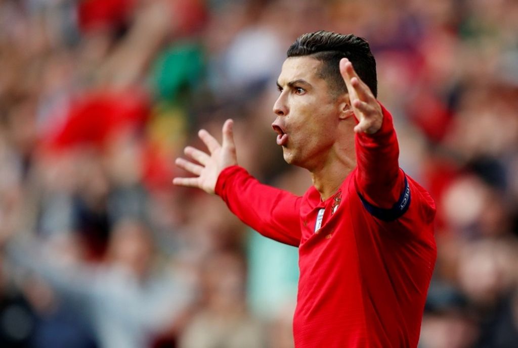 Eskpresi penyerang Portugal, Cristiano Ronaldo, saat menghadapi Swiss pada semifinal Liga Nasional Eropa di Porto, Portugal, 5 Juni 2019. 