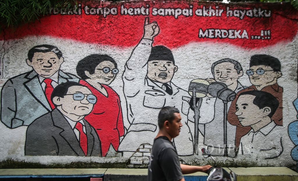 Mural tujuh presiden Republik Indonesia tergambar secara kartunal di sebuah dinding di kawasan Pisangan, Tangerang Selatan, Banten, Minggu (14/11/2021). Komisi Pemilihan Umum meyakini Pemilihan Umum Legislatif dan Pemilihan Presiden 2024 dapat diselenggarakan pada bulan Februari.