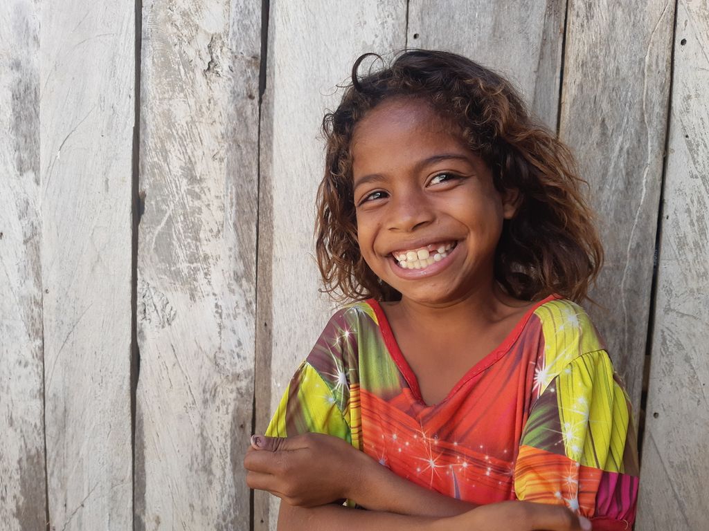 A girl's smile on Lirang Island, Southwest Maluku Regency, Maluku, on Sunday (7/8/2022).