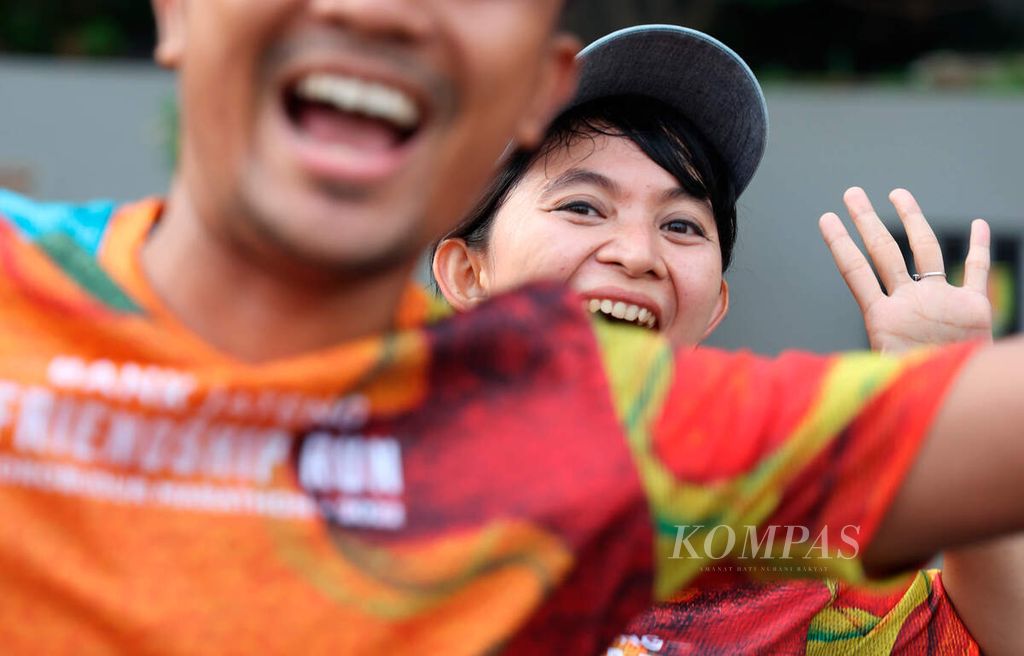 Kegembiraan dari peserta saat mengikuti Bank jateng Friendship Run di Lawang Sewu, Kota Semarang, Jawa Tengah, Minggu (21/8/2022). Lari menjadi bagian dari tren, gaya hidup, dan olahraga rekreasi bagi kaum urban perkotaan. 