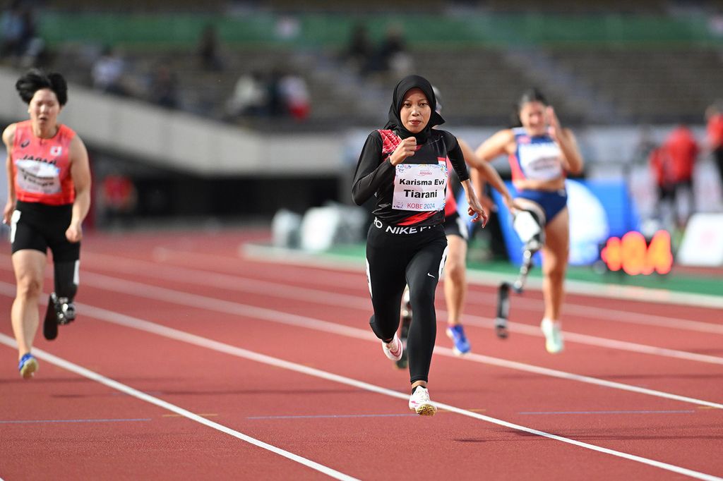 Sprinter putri Indonesia, Karisma Evi Tiarani, dalam pertandingan nomor 100 meter putri T37 Kobe 2024 Para Athletics World Championships di Kobe Universiade Memorial Stadium, Kobe, Jepang, Selasa (21/5/2024). 