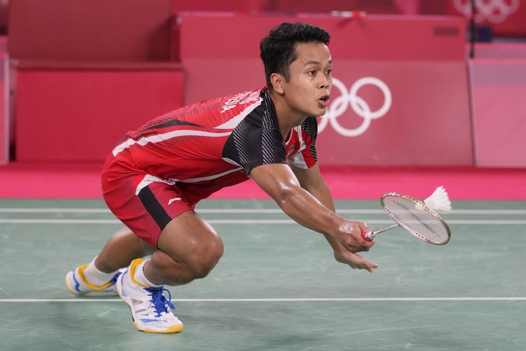 Indonesia's Anthony Sinisuka Ginting competes against China's Chen Long during their men's singles badminton semifinal match at the 2020 Summer Olympics, Sunday, Aug. 1, 2021, in Tokyo, Japan.
