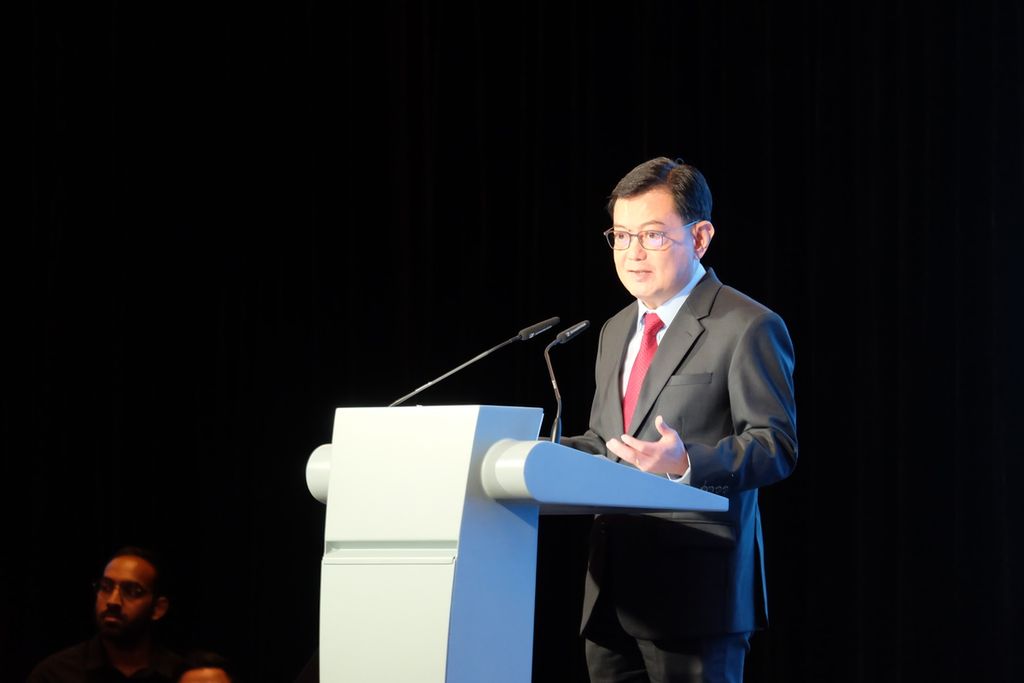 Wakil Perdana Menteri dan Menteri Koordinator Bidang Kebijakan Ekonomi Singapura Heng Swee Keat, Selasa (17/10/2023), menyampaikan pidato kunci untuk membuka Singapore International Cyber Week (SICW) 2023 di Singapura.