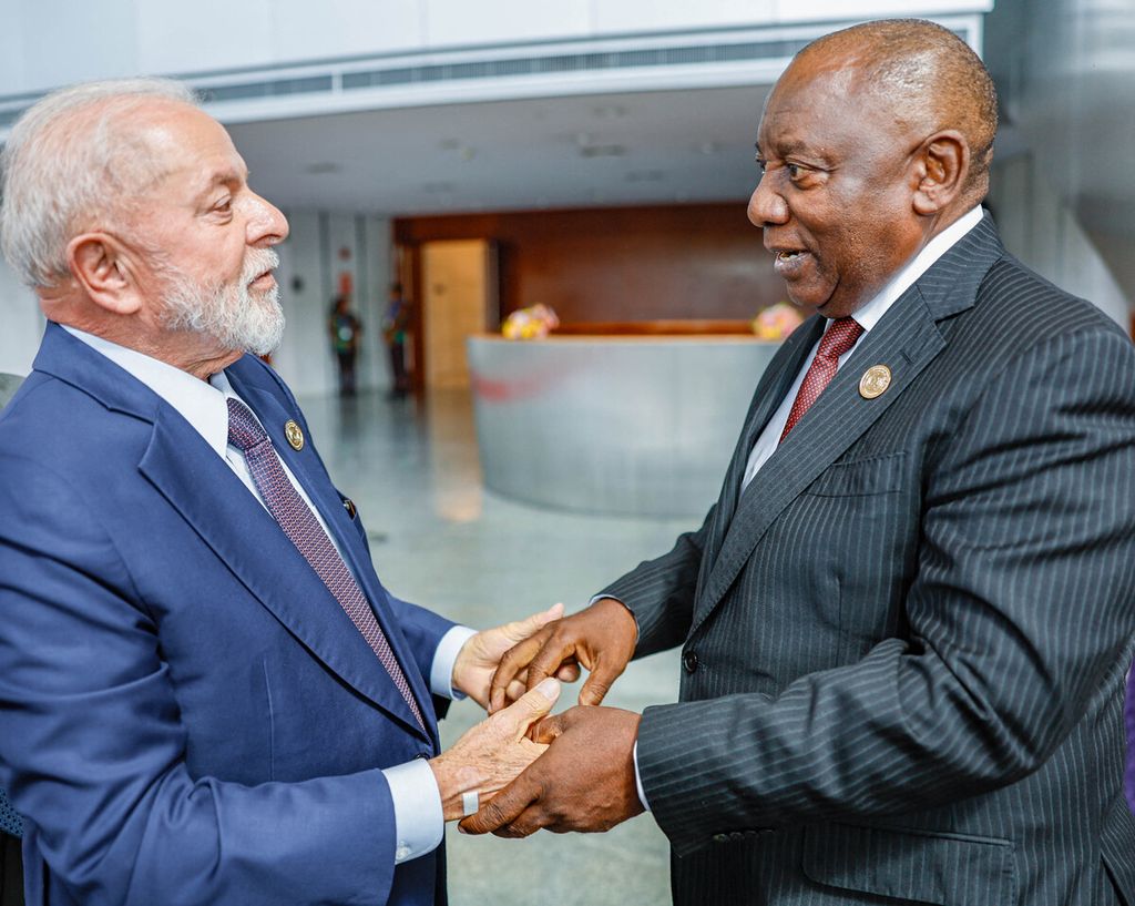 The photo released by the Brazilian Presidential Palace shows Brazilian President Luiz Inacio Lula da Silva (left) being warmly welcomed by South African President Cyril Ramaphosa as the two meet ahead of the 37th African Union Summit in Addis Ababa, Ethiopia on Saturday (2/17/2024).