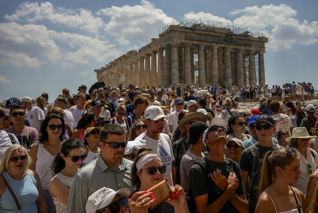 Tourists crowded the Acropolis, a tourist area in Athens, Greece, on July 4, 2023. Local residents protested the impact of excessive tourism in the city on May 16, 2024.