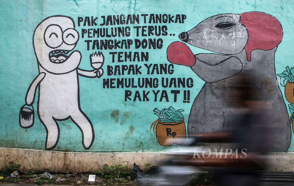 Ekspresi keresahan masyarakat terkait persoalan yang terjadi di negeri ini dituangkan dalam media mural seperti terlihat di kawasan Cipayung, Tangerang Selatan, Banten, Jumat (27/11/2020). Persoalan korupsi, keadilan hukum, dan kesejahteraan sosial menjadi tema yang banyak diangkat ke dalam seni mural. 