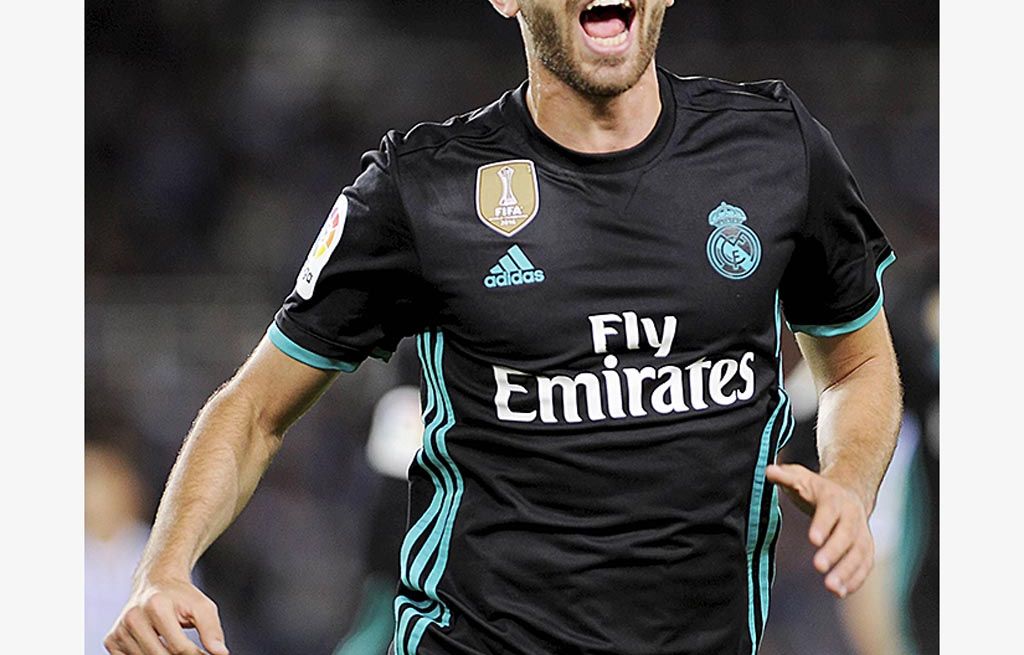 Pemain  Real Madrid, Borja Mayoral, merayakan gol yang dicetaknya ke gawang Real Sociedad pada laga Liga Spanyol, Senin  (18/9) dini hari WIB. Madrid menang dengan skor 3-1.