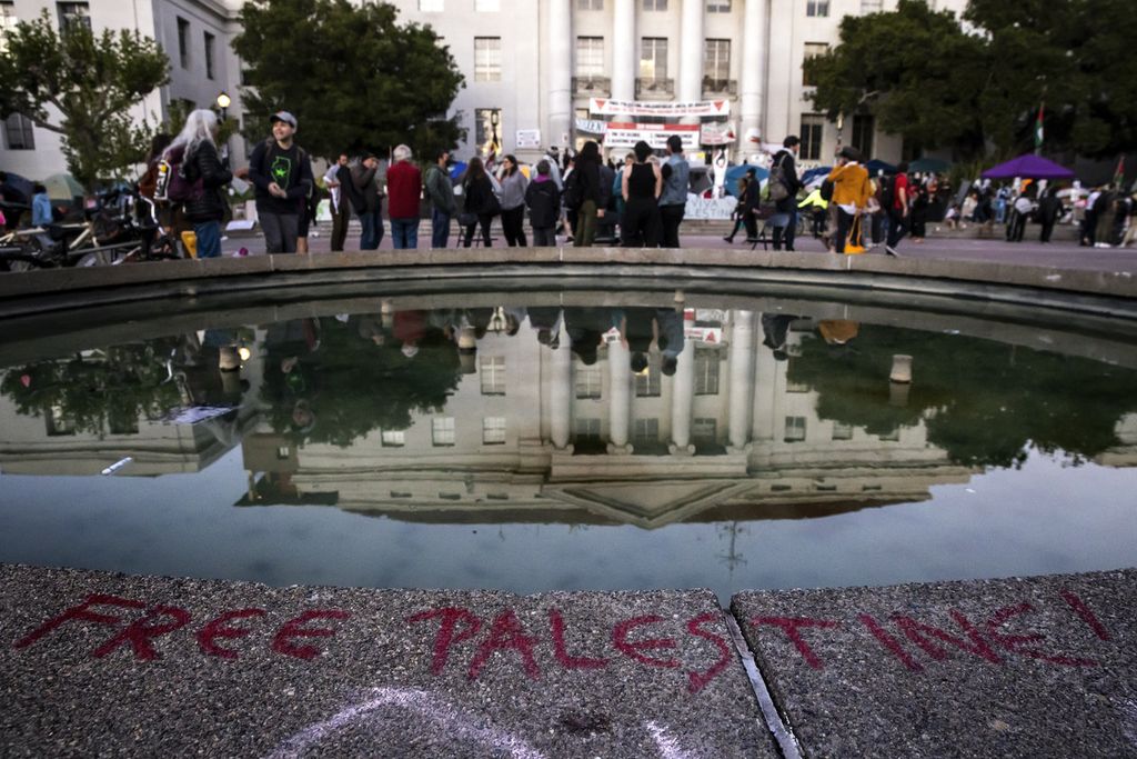 A message that read "Free Palestine!" was written on the edge of the Ludwig Fountain, near a pro-Palestinian protest camp at Sproul Hall in the University of California, Berkeley, US on May 2, 2024.