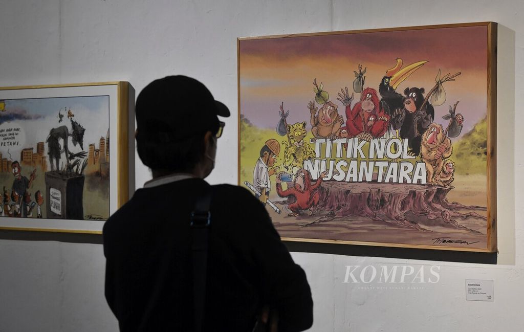 Karya Thomdean berjudul "Last Selfie" dalam pameran kartun bertajuk "I Love U Gudbai" di Bentara Budaya Jakarta, Kamis (3/8/2023). Pameran yang menampilkan karya dari delapan kartunis itu akan berlangsung hingga 12 Agustus 2023. Selain pameran, juga akan digelar <i>workshop </i>gambar dan seminar dengan melibatkan para seniman peserta pameran yang bekerja sama dengan Institute Humor Indonesia Kini (IHIK). 