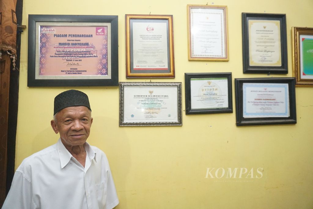 Sangadi atau kepala Desa Mengkang 2007-2018, Marsidi Kadengkang (65), ketika ditemui di rumahnya, 13 Juli 2022, di Kopandakan, Kotamobagu, Sulawesi Utara.