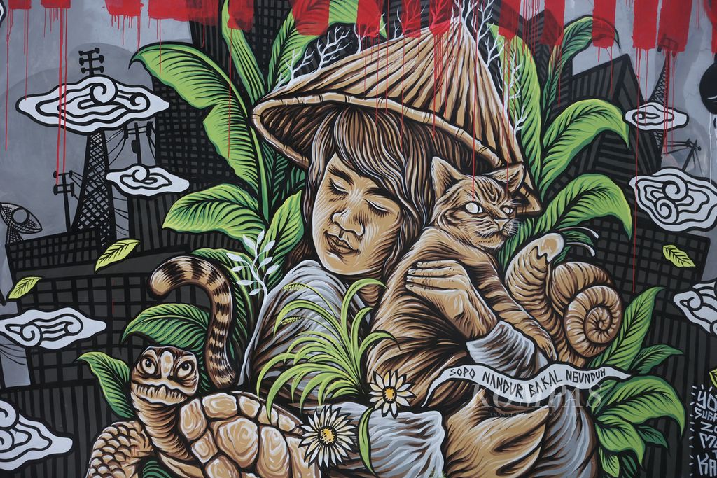 Lukisan mural dengan beragam mural menghiasi sejumlah bangunan di Dusun Ngaglik, Desa Pendowoharjo, Sewon, Bantul, DI Yogyakarta, Rabu (18/1/2023). Sedikitnya 40 seniman mural dalam negeri dan lima seniman mural dari mancanegara, yang tergabung dalam Cosmos Street Art Studio, menggelar kegiatan melukis mural bersama di Dusun Ngaglik dalam ajang yang dinamai Mural to Kampung. 