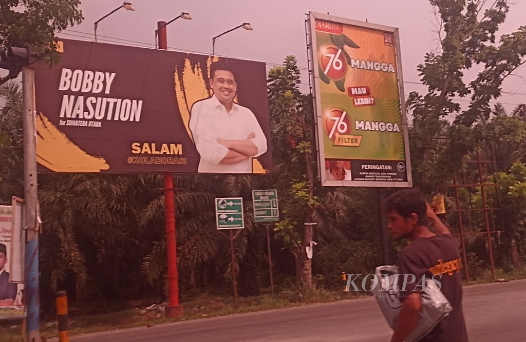 Foto Wali Kota Medan Bobby A Nasution dipasang di dekat Gerbang Tol Kota Binjai, Sumatera Utara, Jumat (10/5/2024). Nama Bobby semakin menguat sebagai calon gubernur Sumut. 